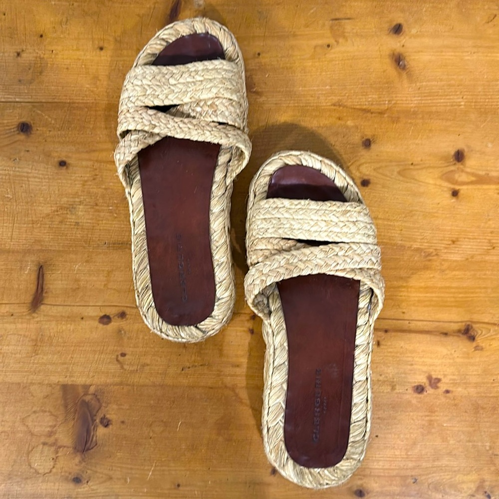 Gorgeous platform sandals with natural fibers and leather insoles.